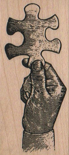 Hand Holding Jigsaw Puzzle Piece 1 1/2 x 3 1/2-0