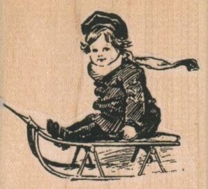 Boy on Sled 2 1/4 x 2-0