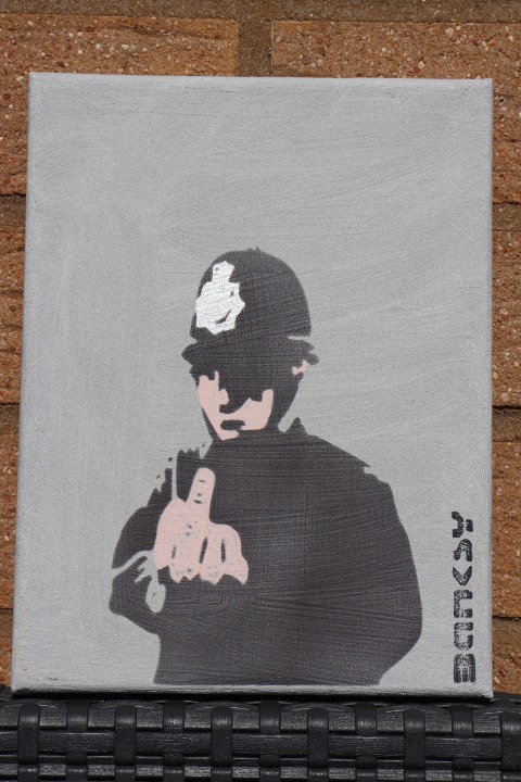 Banksy Cop Giving Finger 2 x 2 1/4-42300
